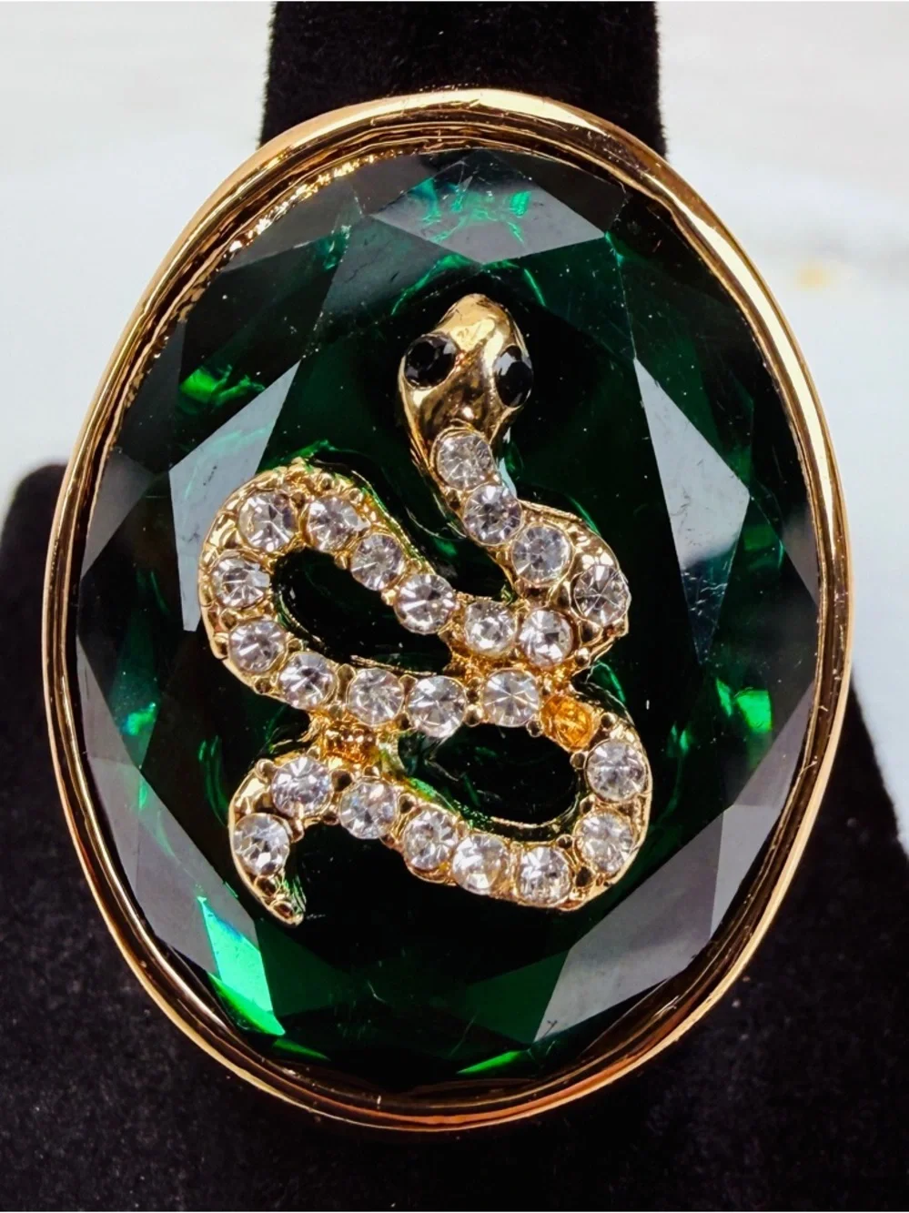 Beautiful, goldtone, emerald green bling snake statement ring
